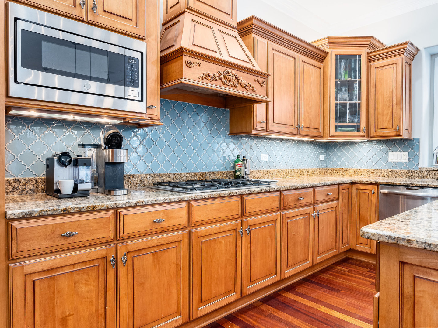 2223 Spartina Lane Naperville, IL 60564 - Photo 10 of 48 a kitchen with granite countertop a sink and cabinets