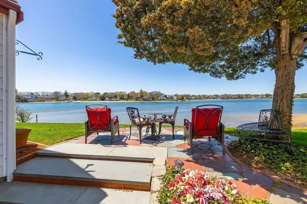 a view of a lake with a patio