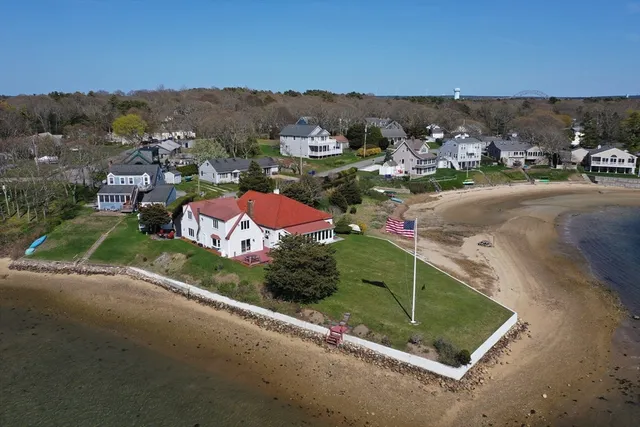 an aerial view of residential houses and outdoor space