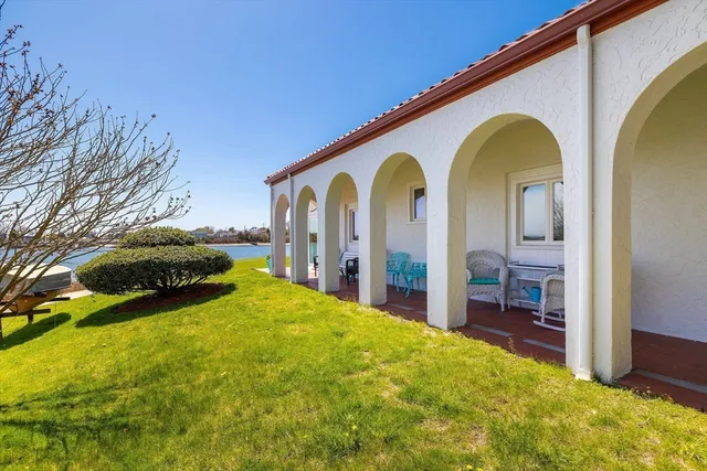 a view of swimming pool with a backyard