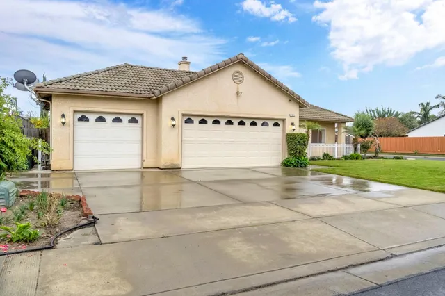 a view of garage with a outdoor space