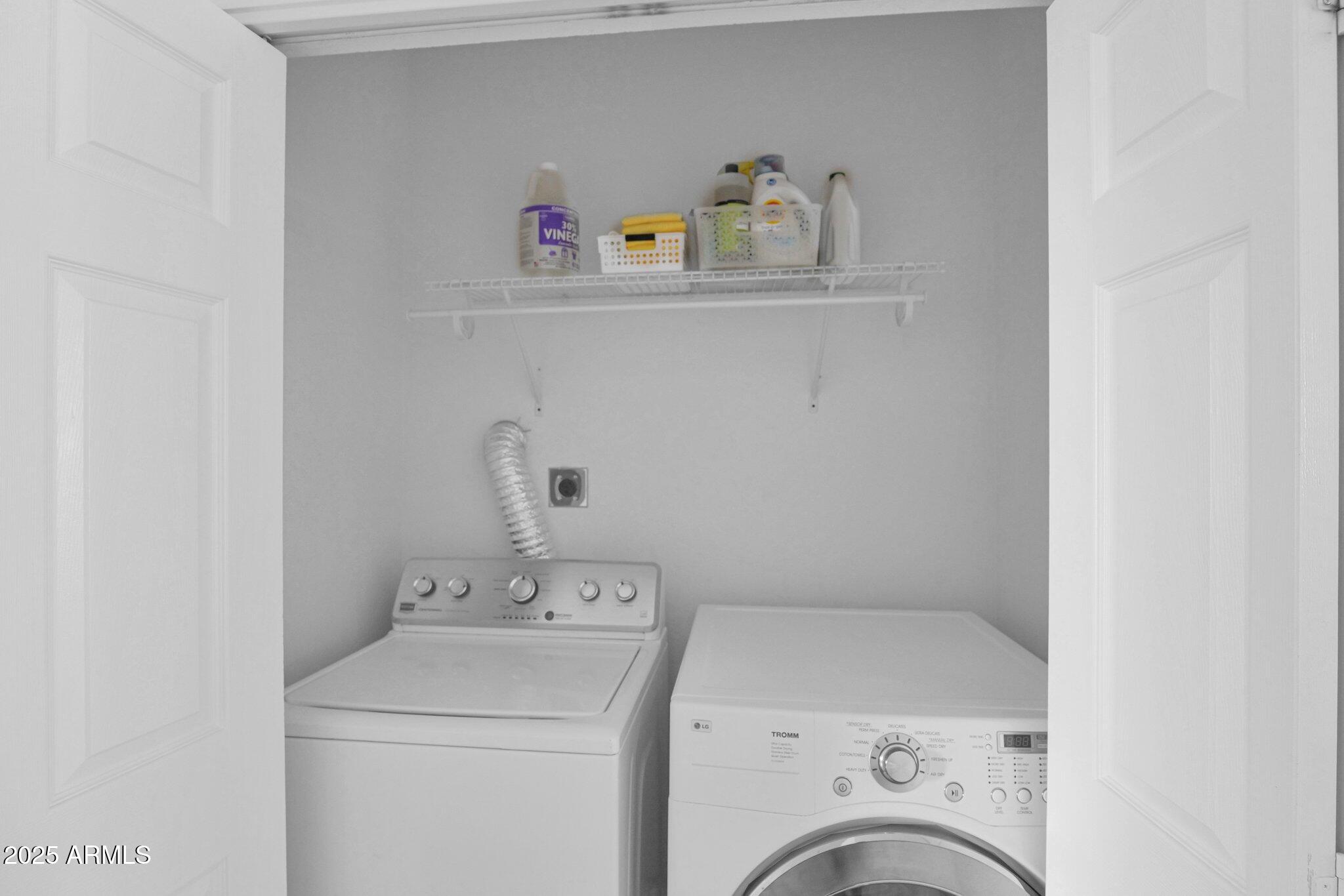 8270 North Hayden Road, Unit 2013 Scottsdale, AZ 85258 - Photo 16 of 53 a utility room with dryer and washer