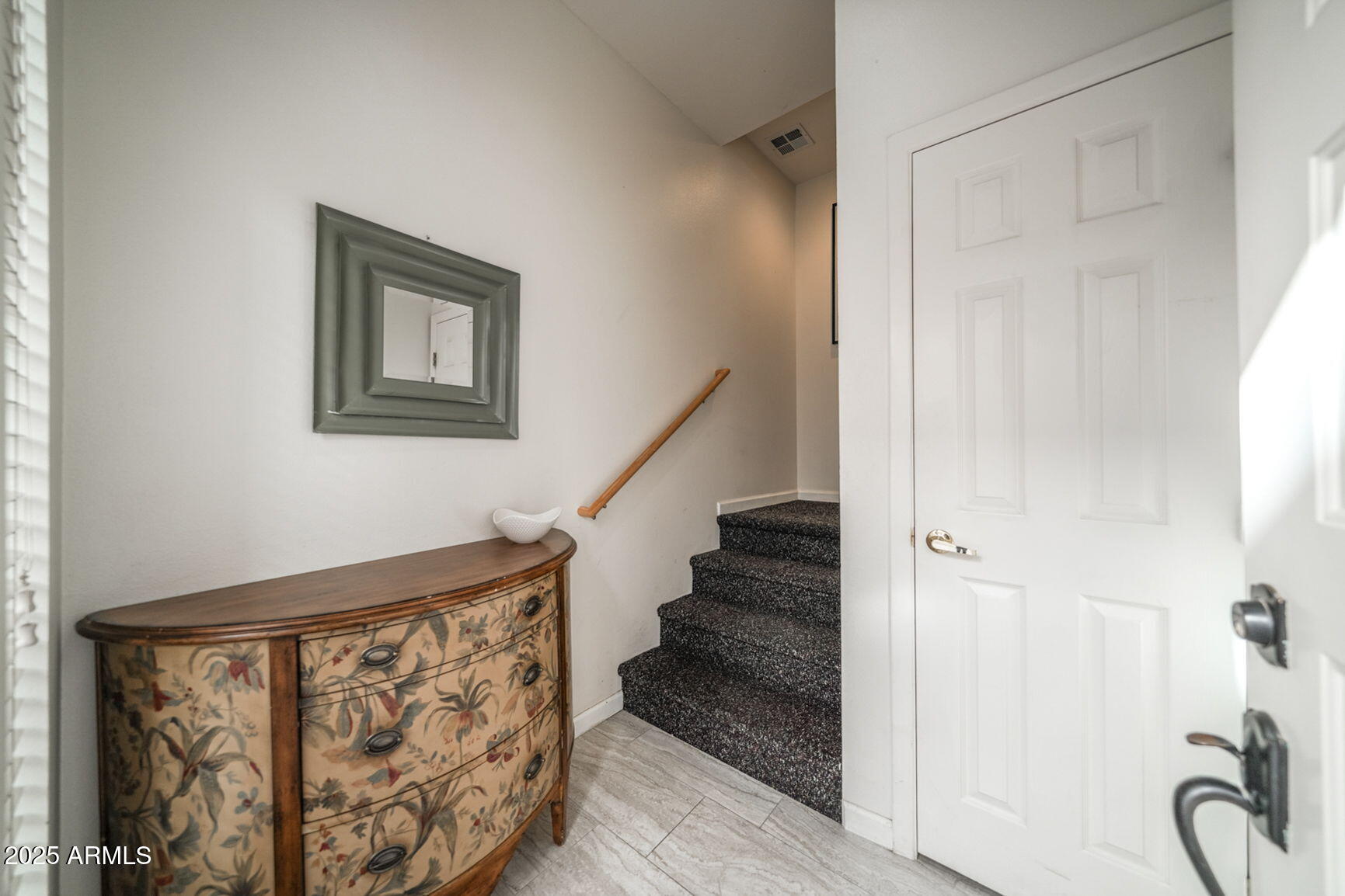 8270 North Hayden Road, Unit 2013 Scottsdale, AZ 85258 - Photo 3 of 53 a view of a hallway with wooden floor and entryway