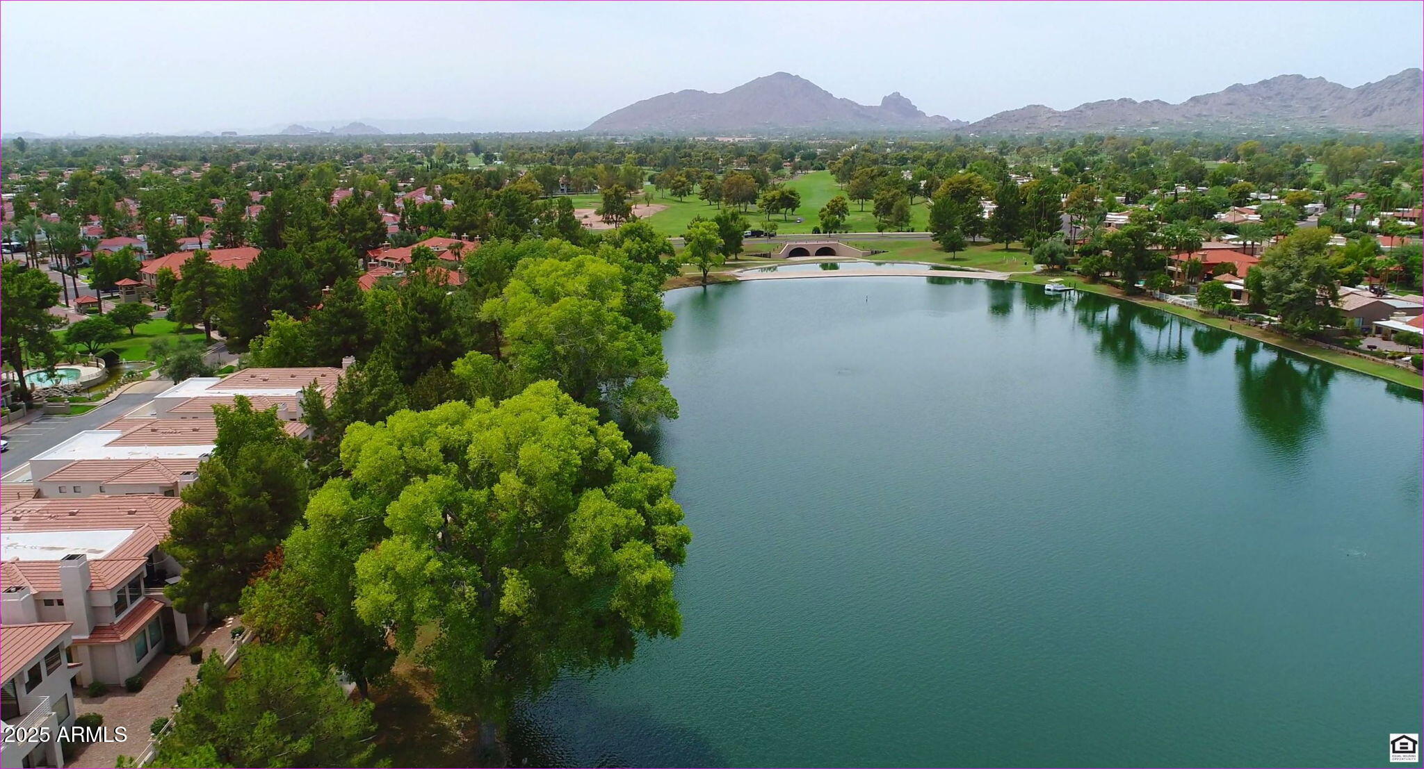 8270 North Hayden Road, Unit 2013 Scottsdale, AZ 85258 - Photo 51 of 53 a view of a lake with a mountain in the background
