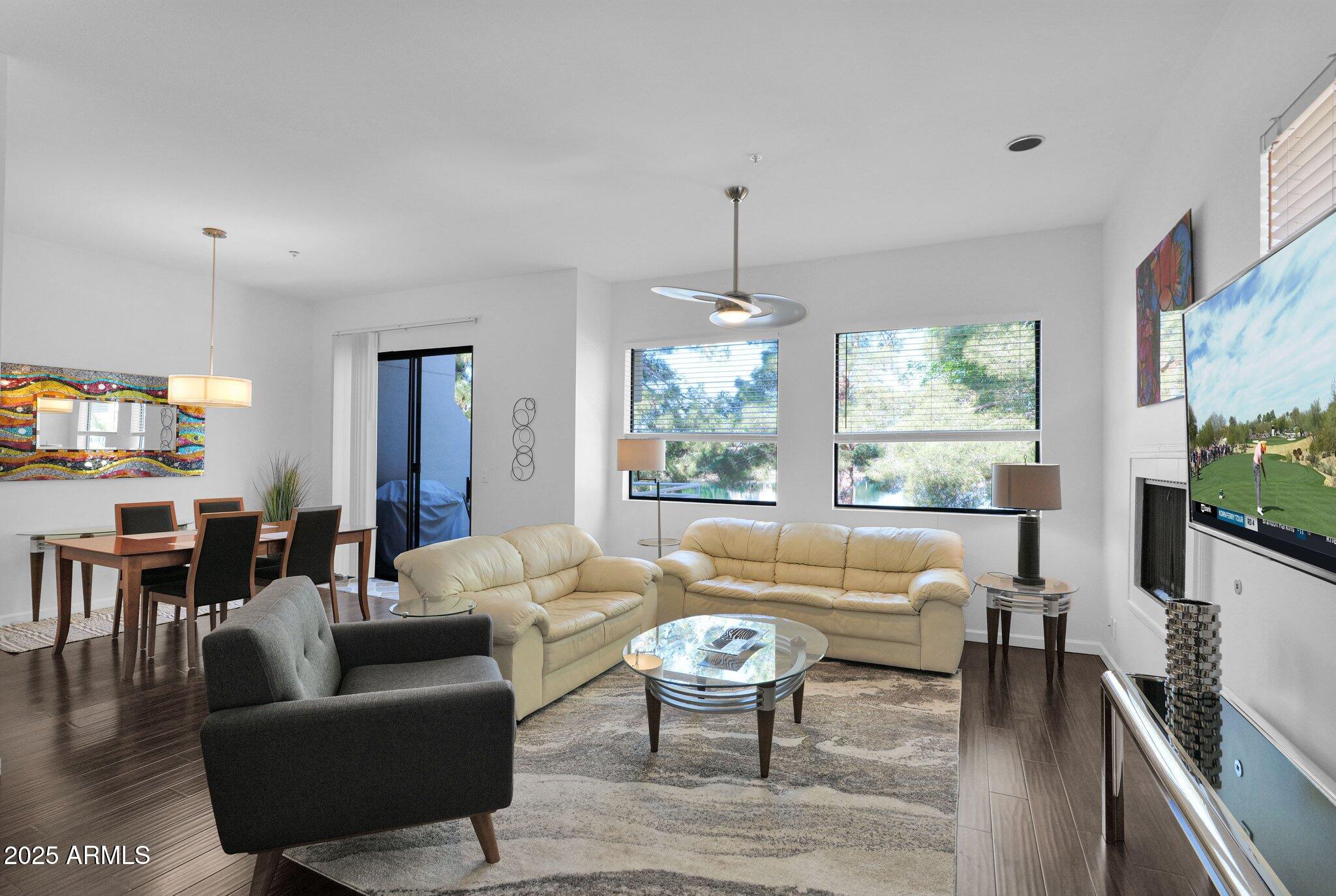 8270 North Hayden Road, Unit 2013 Scottsdale, AZ 85258 - Photo 7 of 53 a living room with furniture and a large window