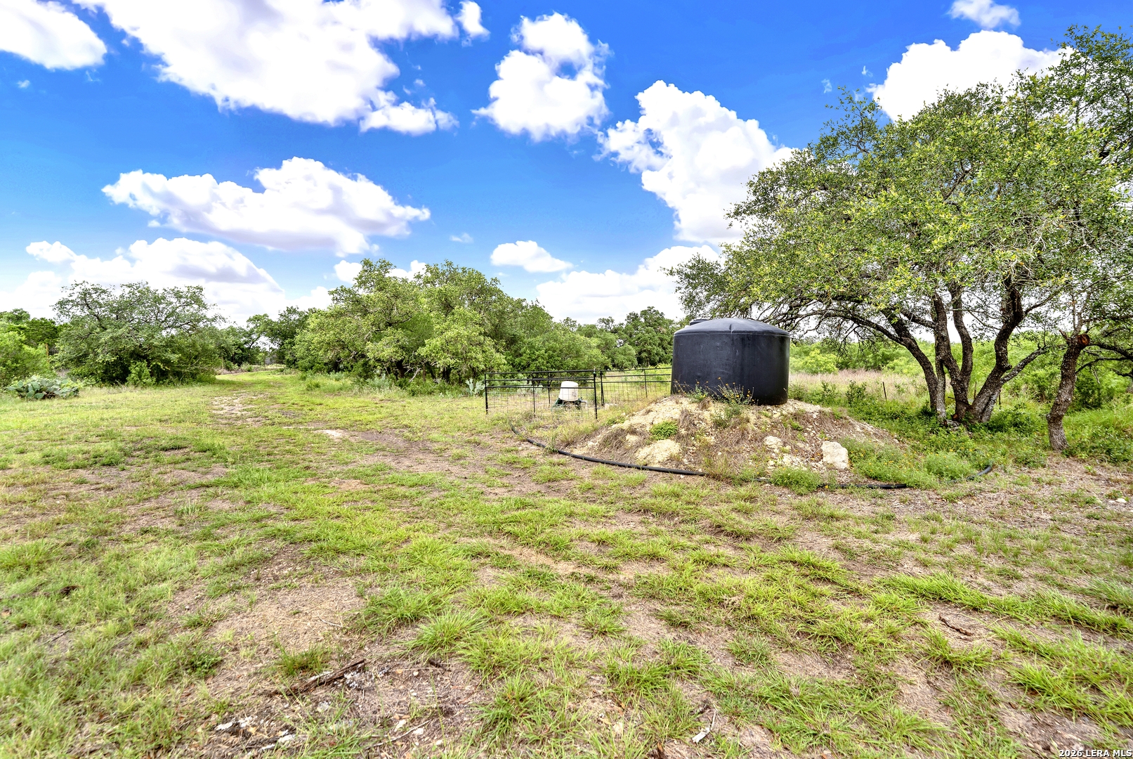 0 Fm 1796 D'Hanis, TX 78850 - Photo 18 of 26 a swimming pool with an outdoor space and seating