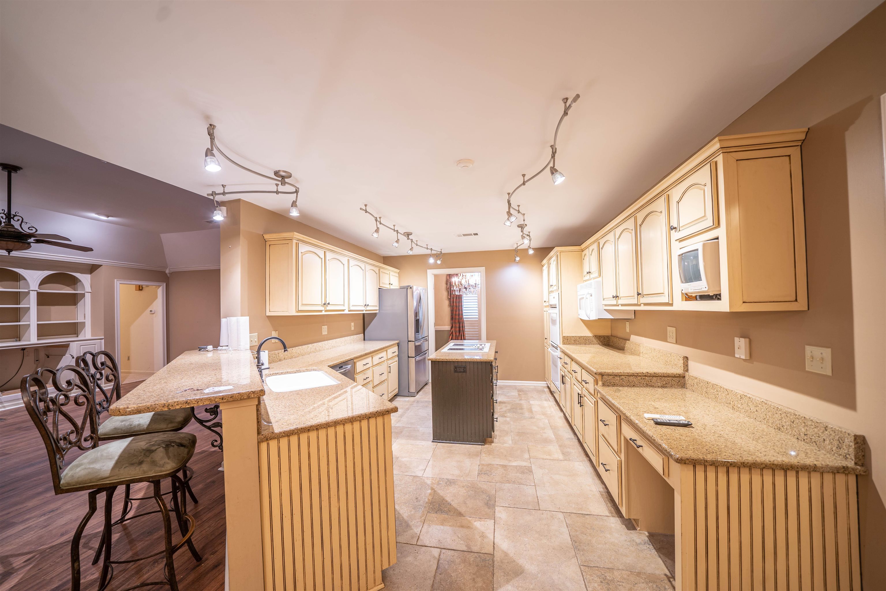 110 Fisherville Road Collierville, TN 38017 - Photo 15 of 21 a living room with furniture and a chandelier