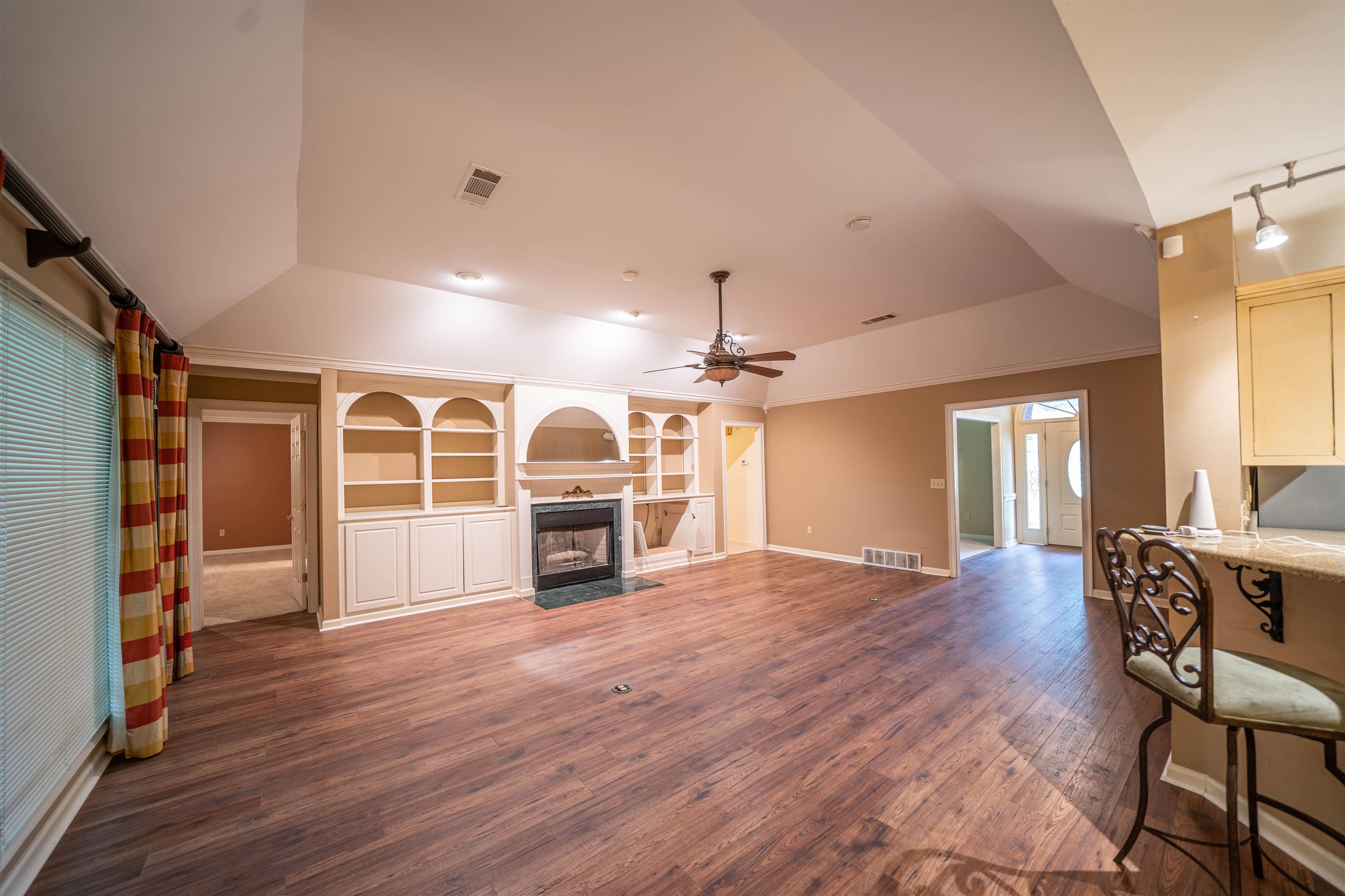 110 Fisherville Road Collierville, TN 38017 - Photo 16 of 21 a view of a livingroom with furniture wooden floor and window