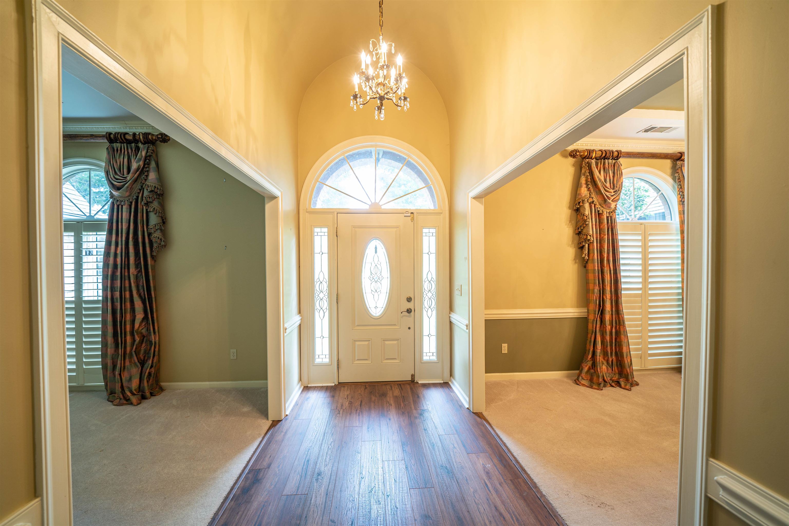 110 Fisherville Road Collierville, TN 38017 - Photo 17 of 21 a view of empty room with wooden floor and windows
