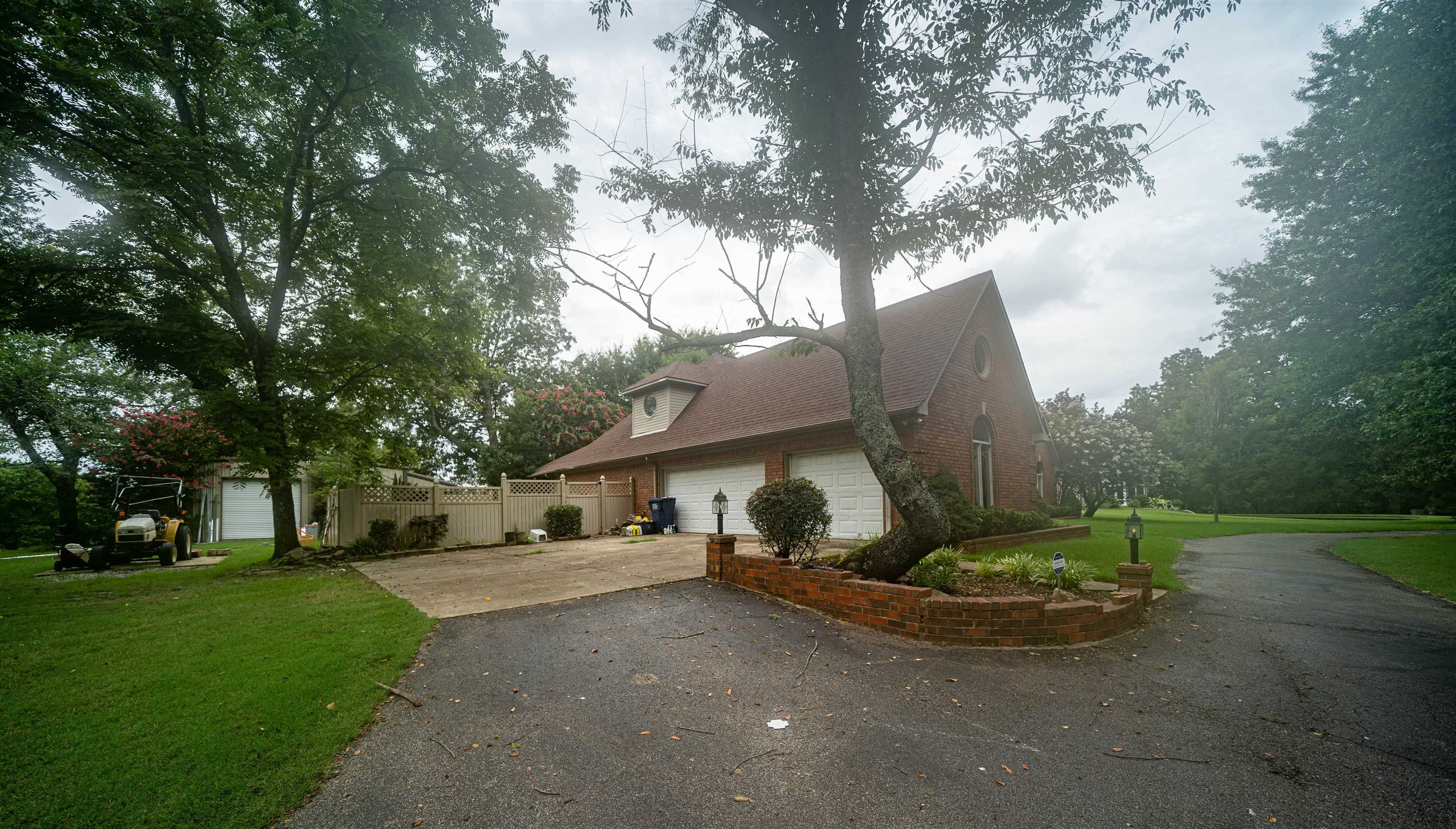 110 Fisherville Road Collierville, TN 38017 - Photo 20 of 21 a front view of a house with a yard and tree s