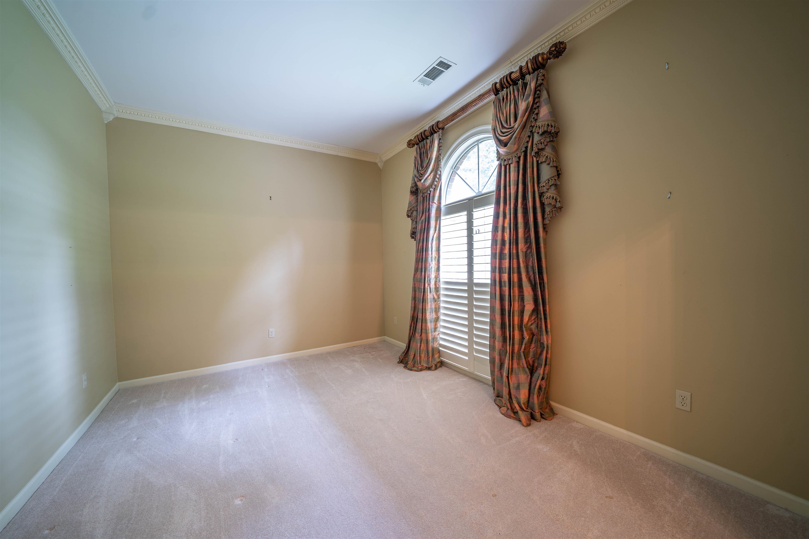 110 Fisherville Road Collierville, TN 38017 - Photo 4 of 21 an empty room with windows