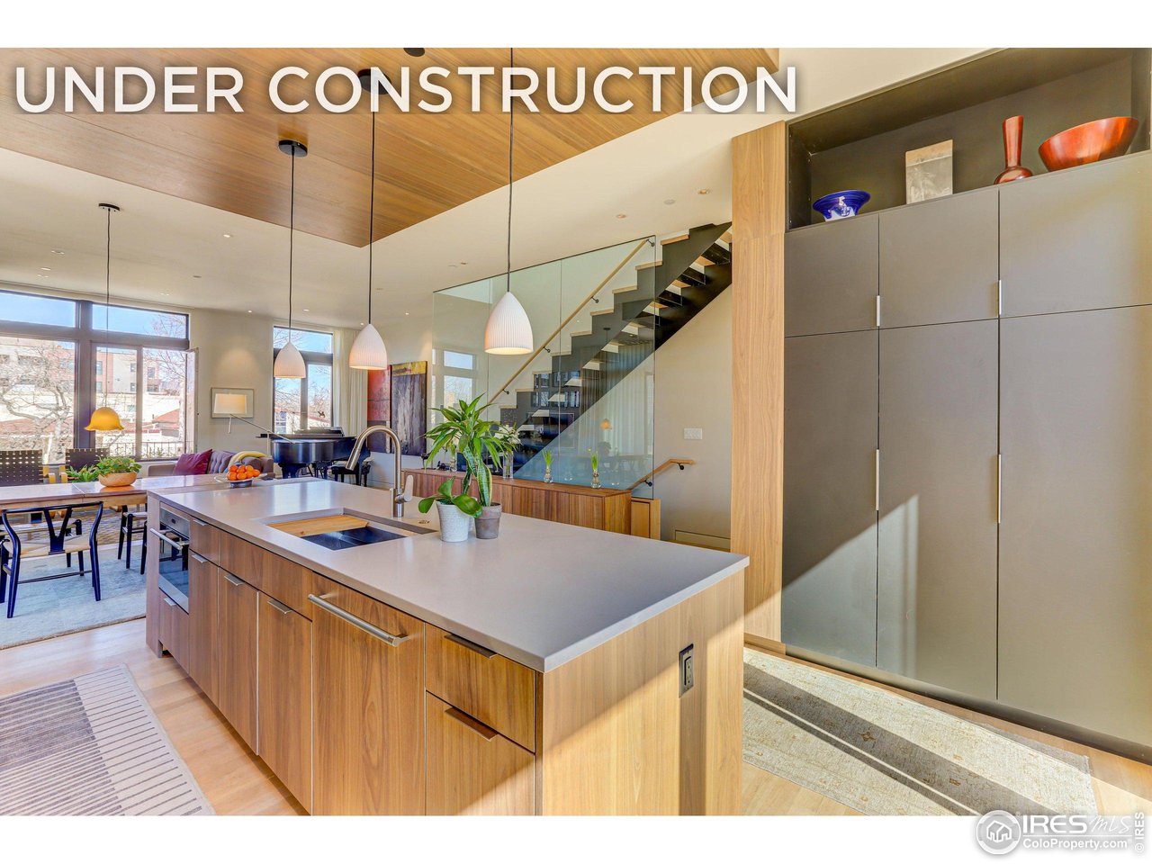 153 Mathews Street Fort Collins, CO 80524 - Photo 24 of 30 a view of a kitchen and dining room