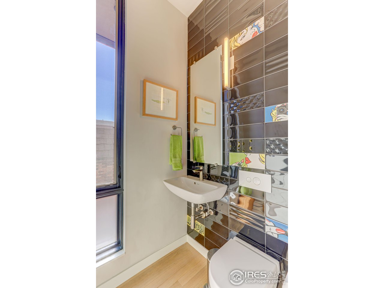 153 Mathews Street Fort Collins, CO 80524 - Photo 26 of 30 a bathroom with a sink and a mirror