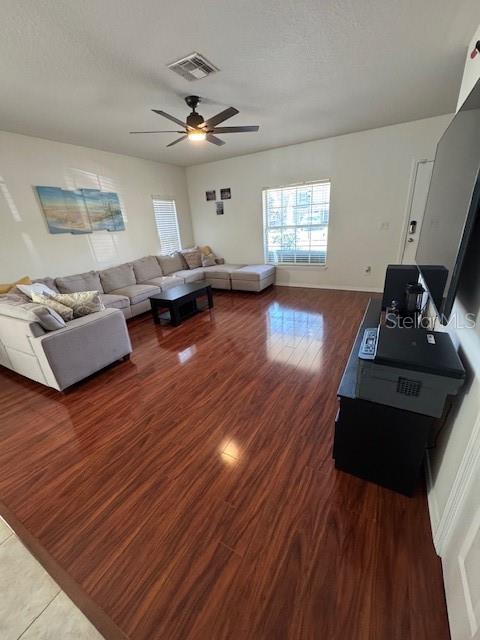4632 Chatterton Way Riverview, FL 33578 - Photo 4 of 13 a living room with furniture and a wooden floor