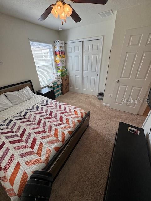 4632 Chatterton Way Riverview, FL 33578 - Photo 9 of 13 a bedroom with a bed and dresser