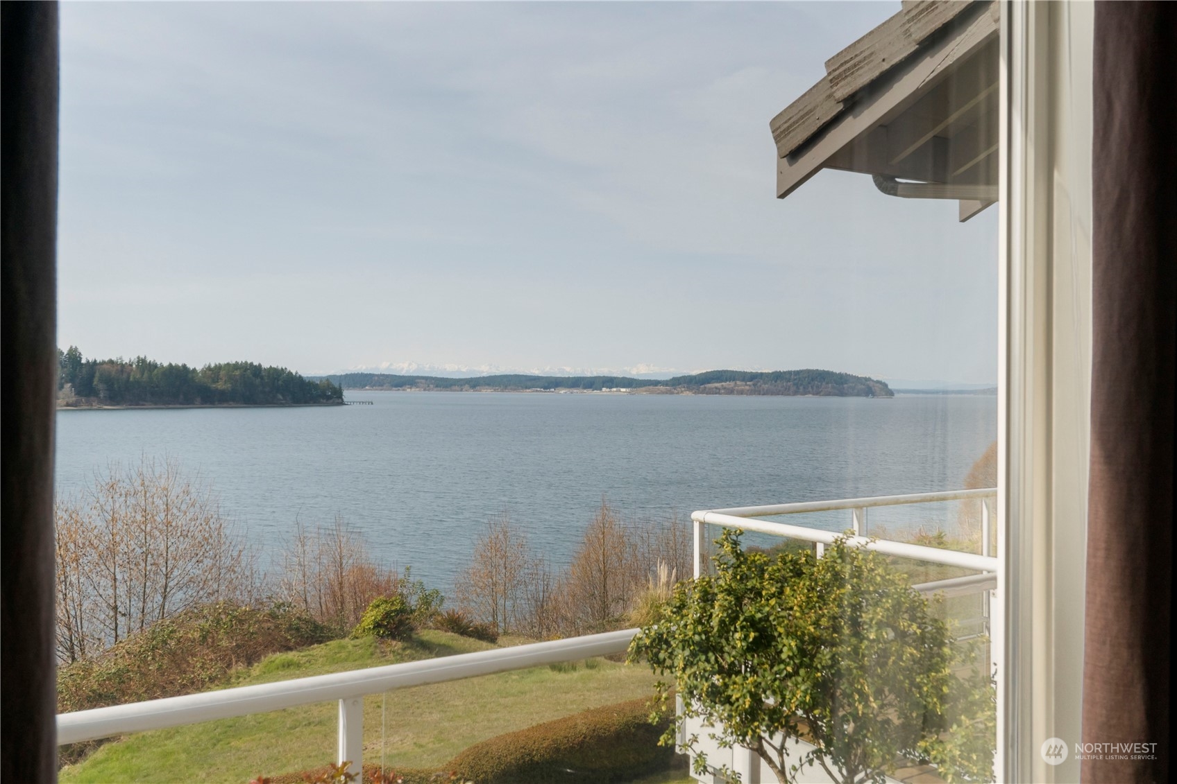52 Chapman Loop, Unit C Steilacoom, WA 98388 - Photo 34 of 40 a view of a lake from a window