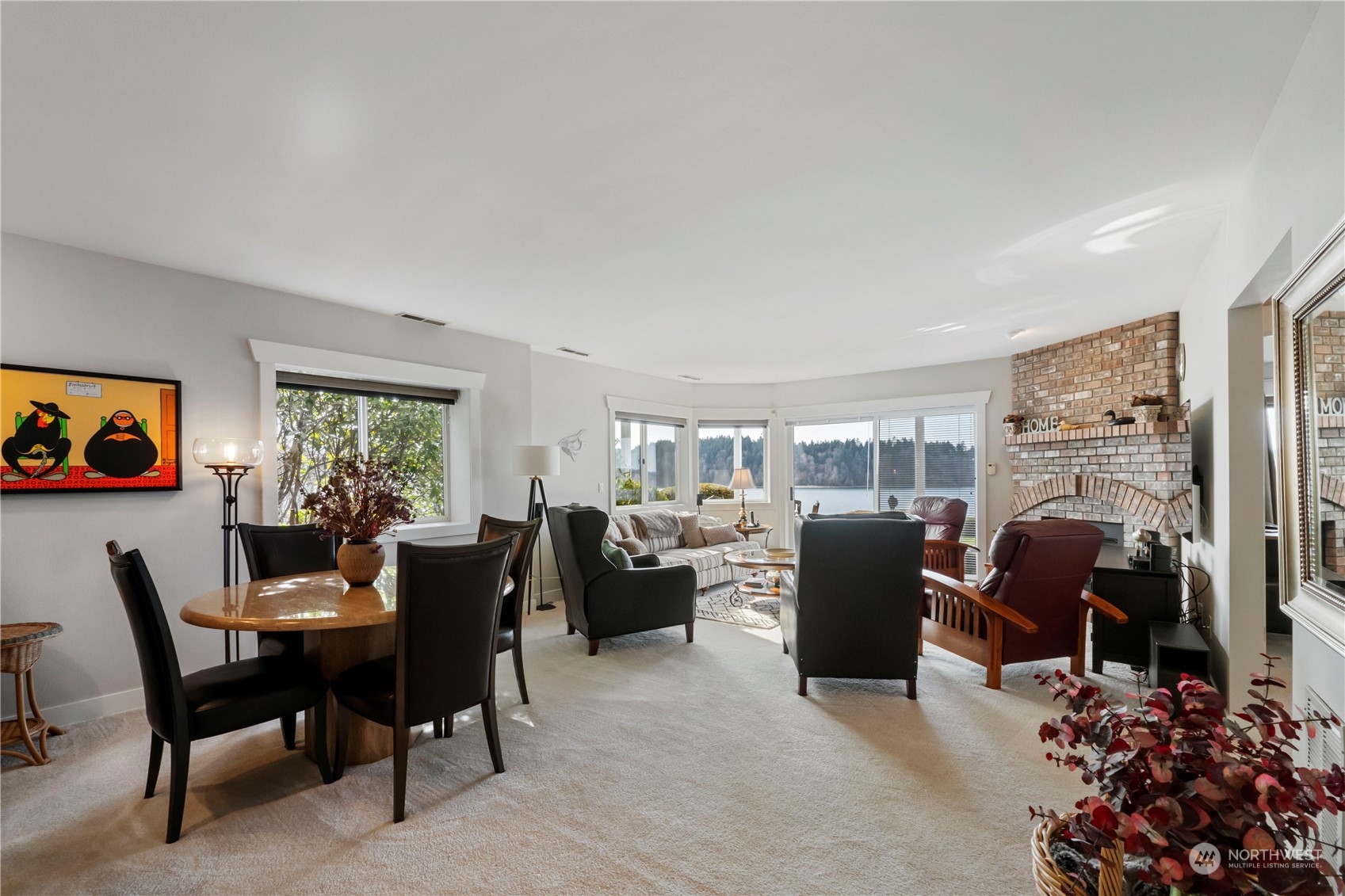52 Chapman Loop, Unit C Steilacoom, WA 98388 - Photo 36 of 40 a living room with furniture and a window
