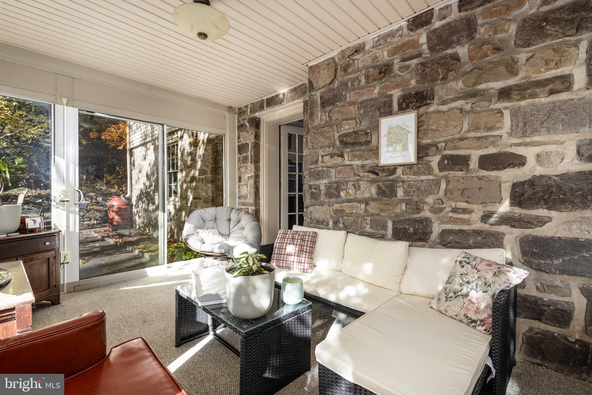 516 Beaver Road Glenside, PA 19038 - Photo 12 of 39 a living room with furniture and a floor to ceiling window