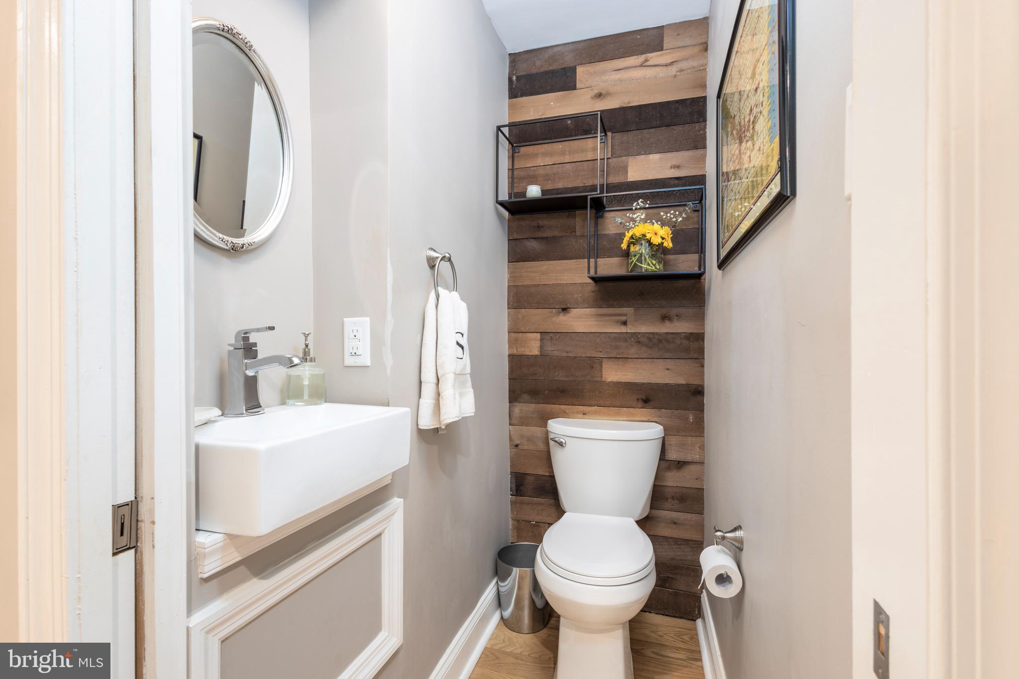 516 Beaver Road Glenside, PA 19038 - Photo 15 of 39 a bathroom with a toilet sink and mirror