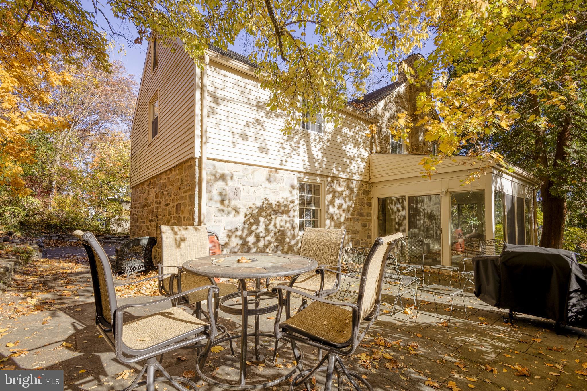 516 Beaver Road Glenside, PA 19038 - Photo 16 of 39 a view of a patio with table and chairs and potted plants