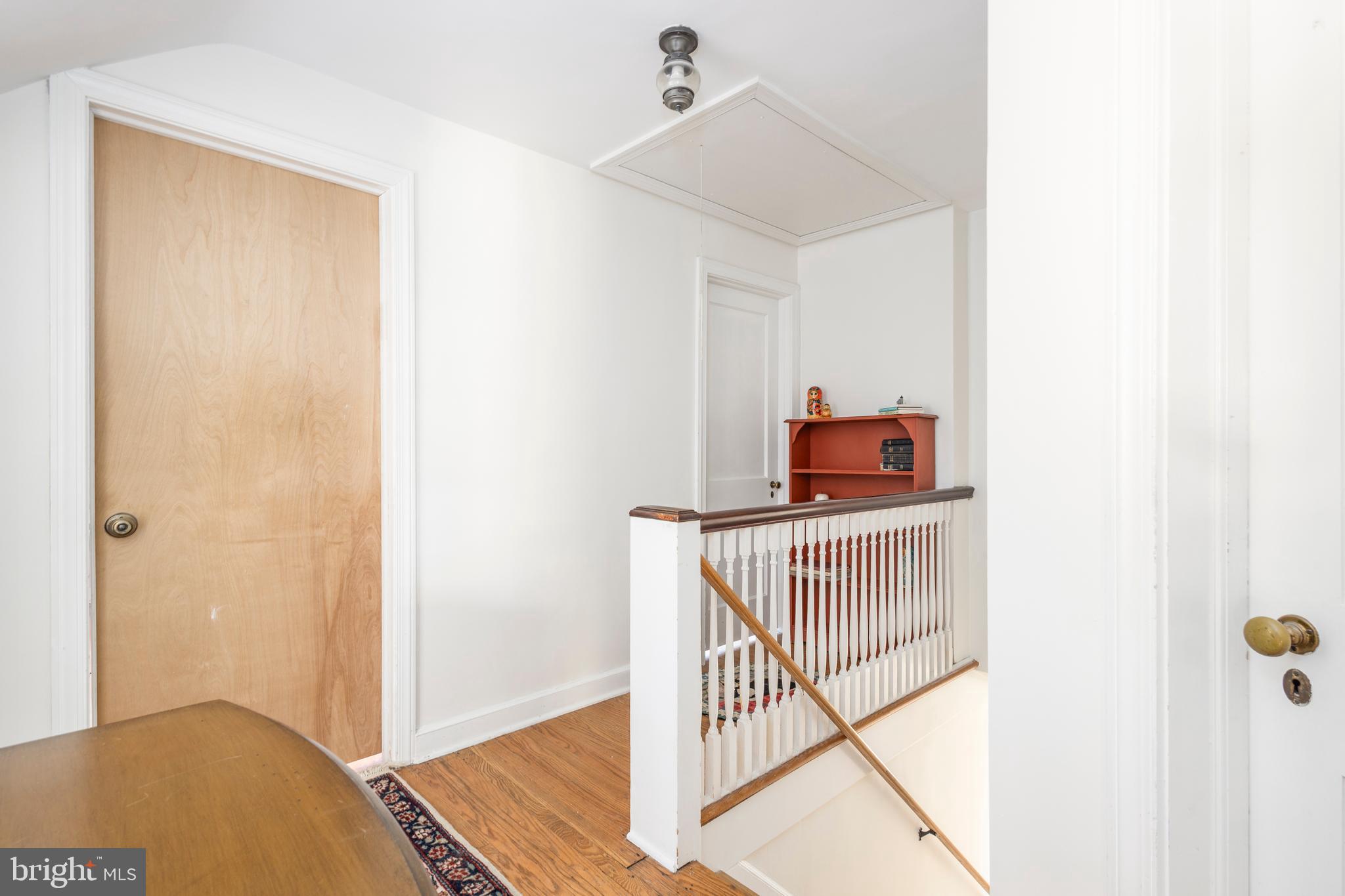 516 Beaver Road Glenside, PA 19038 - Photo 17 of 39 a bedroom with a bed and wooden floor