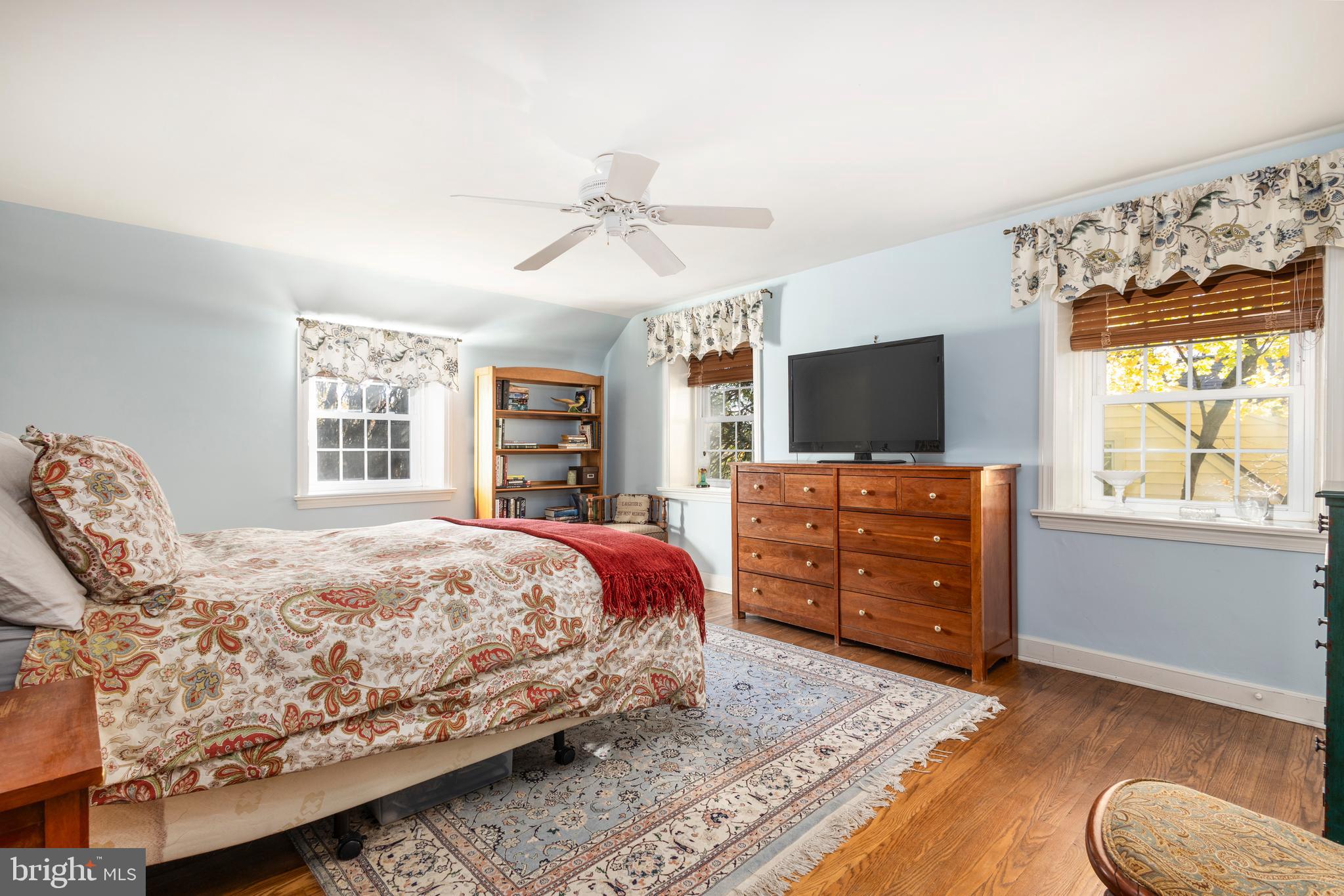 516 Beaver Road Glenside, PA 19038 - Photo 18 of 39 a bedroom with a bed and a flat screen tv