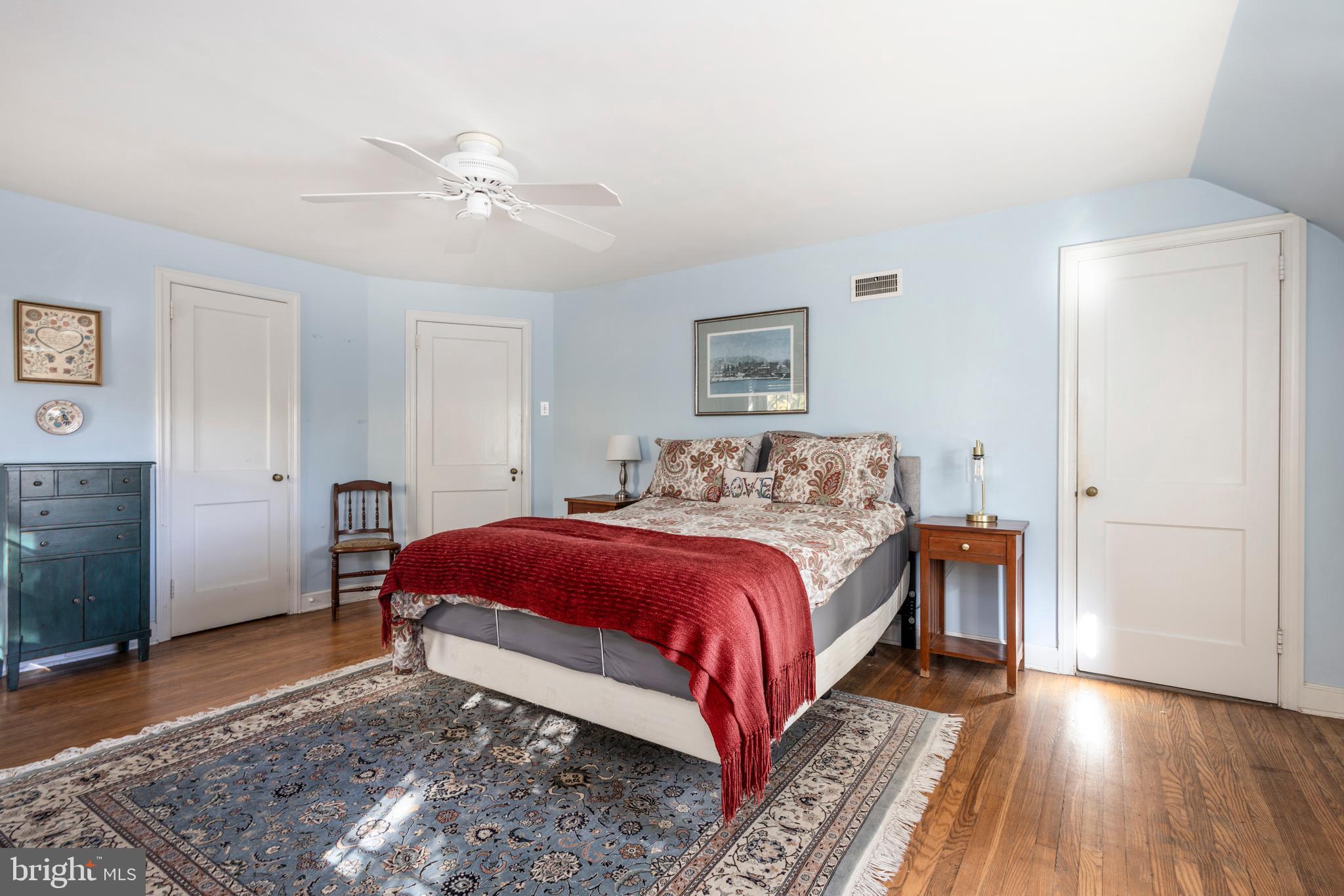 516 Beaver Road Glenside, PA 19038 - Photo 19 of 39 a bedroom with a bed and a chandelier