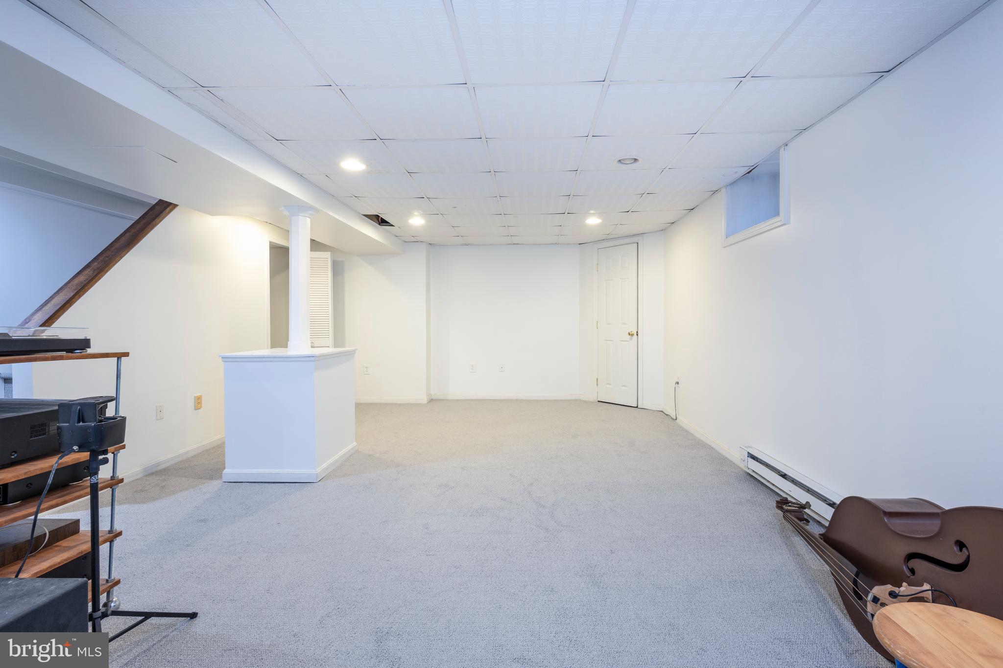 516 Beaver Road Glenside, PA 19038 - Photo 30 of 39 a view of a livingroom with furniture and a fireplace