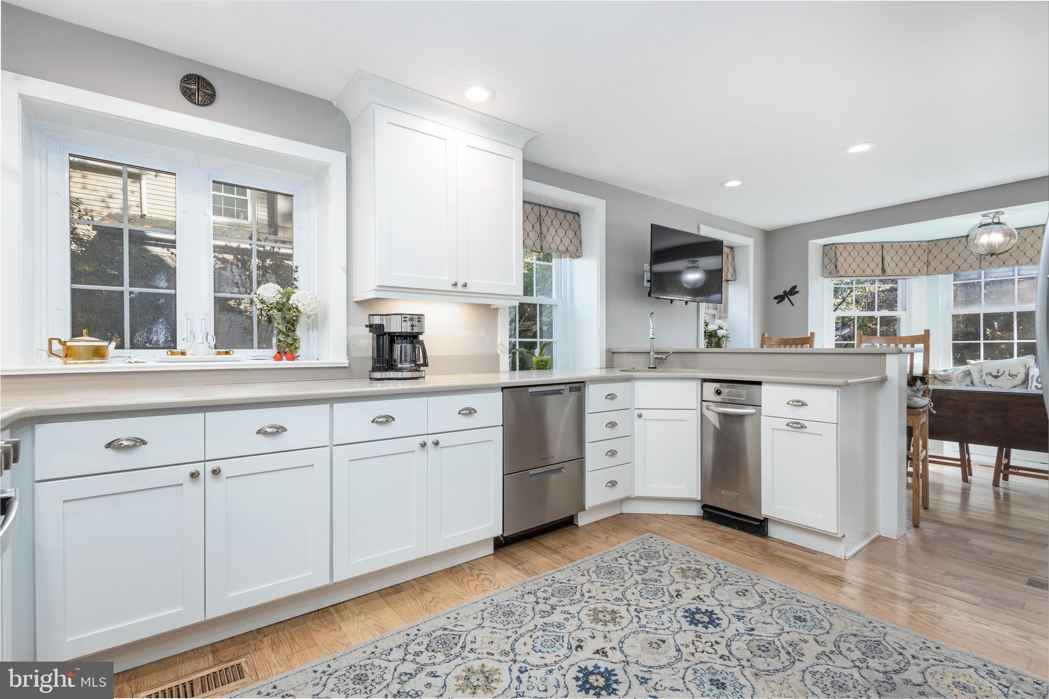 516 Beaver Road Glenside, PA 19038 - Photo 4 of 39 a kitchen with white cabinets and sink