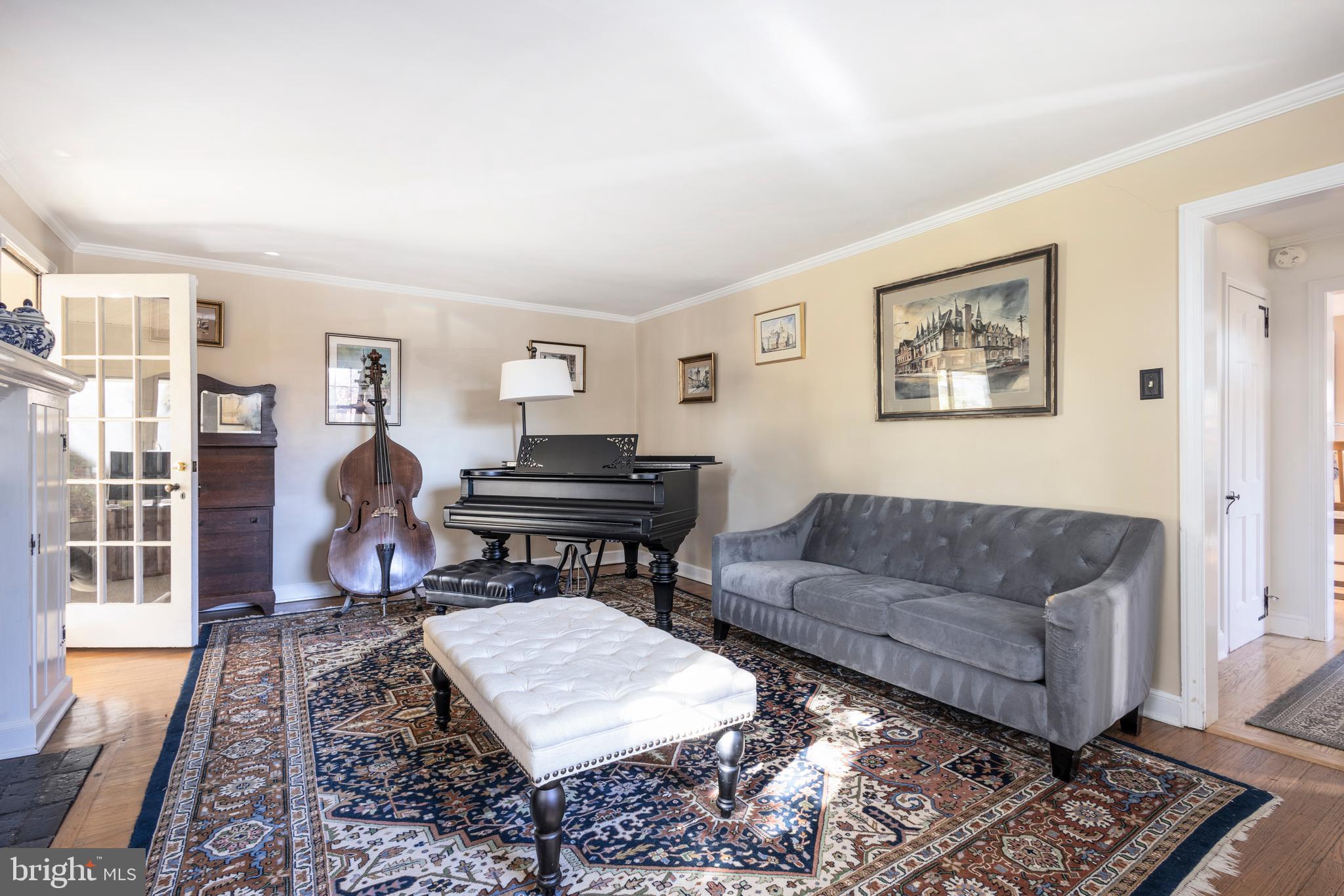 516 Beaver Road Glenside, PA 19038 - Photo 9 of 39 a living room with furniture a rug and a window