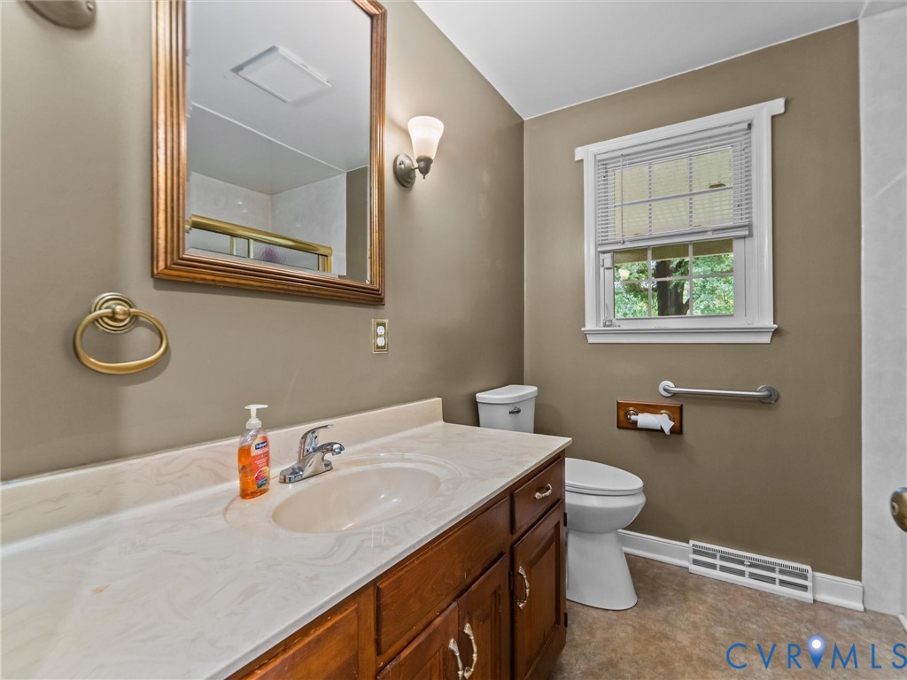 3420 State Rte 656 Powhatan, VA 23139 - Photo 21 of 37 a bathroom with a granite countertop sink mirror vanity and toilet
