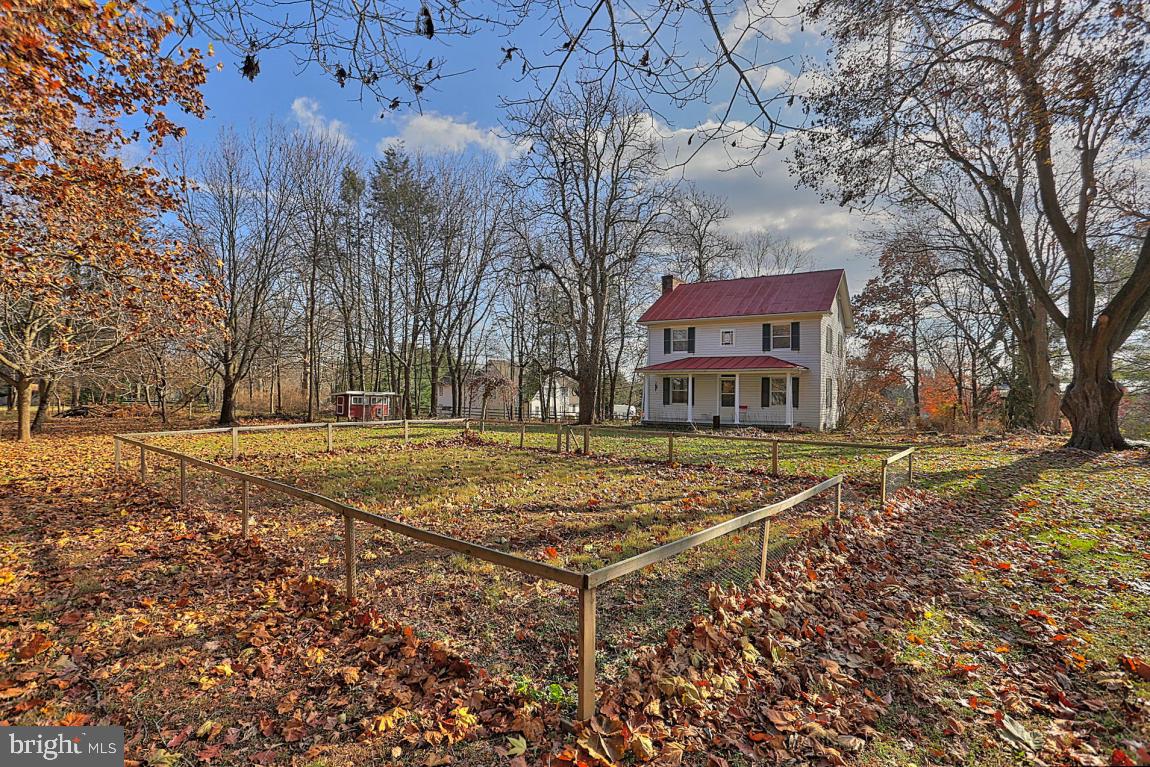 181 Windover Turn Lancaster, PA 17601 - Photo 33 of 58 a view of a tennis ground with large trees