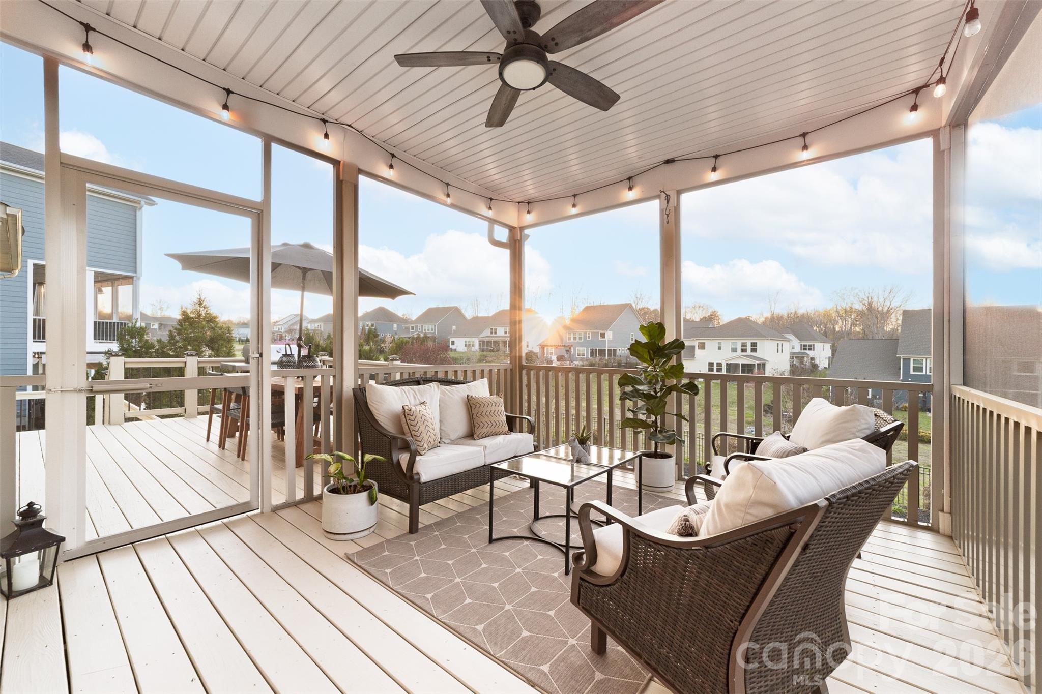 17549 Julees Walk Lane Davidson, NC 28036 - Photo 19 of 48 a balcony with furniture and view of lake