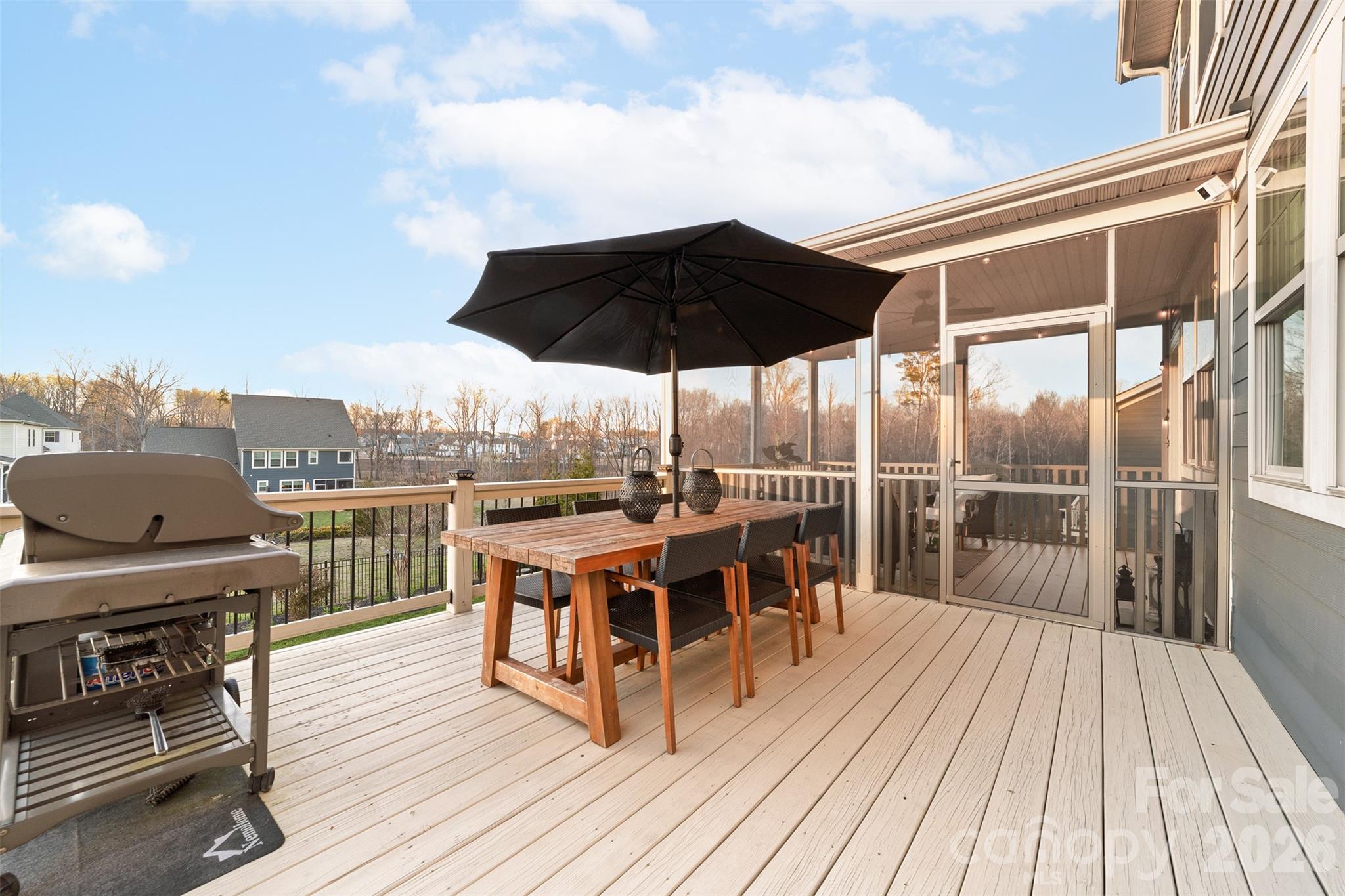 17549 Julees Walk Lane Davidson, NC 28036 - Photo 20 of 48 a view of a roof deck with wooden floor
