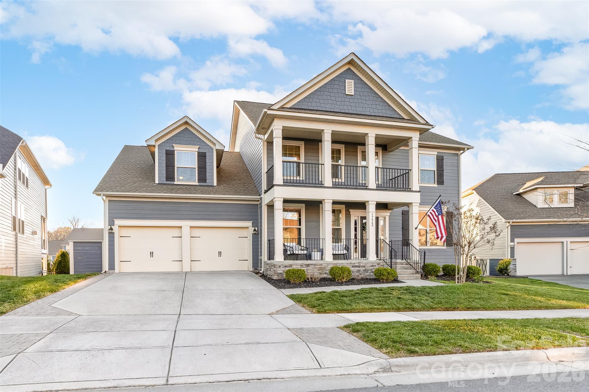 17549 Julees Walk Lane Davidson, NC 28036 - Photo 2 of 48 a front view of a house with a yard