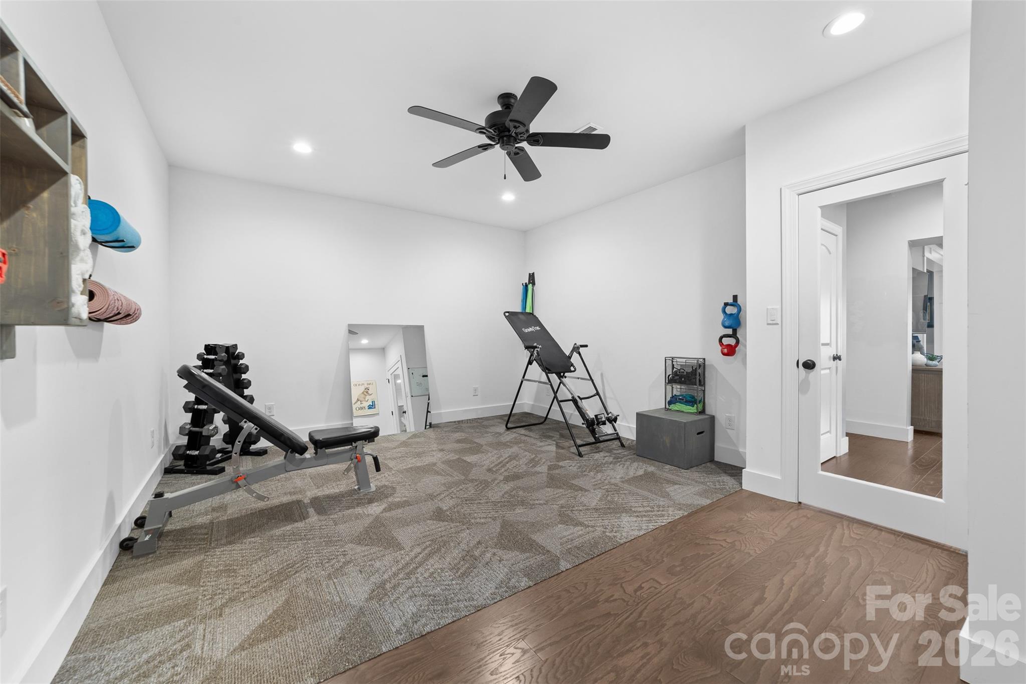 17549 Julees Walk Lane Davidson, NC 28036 - Photo 27 of 48 a view of a room with gym equipment