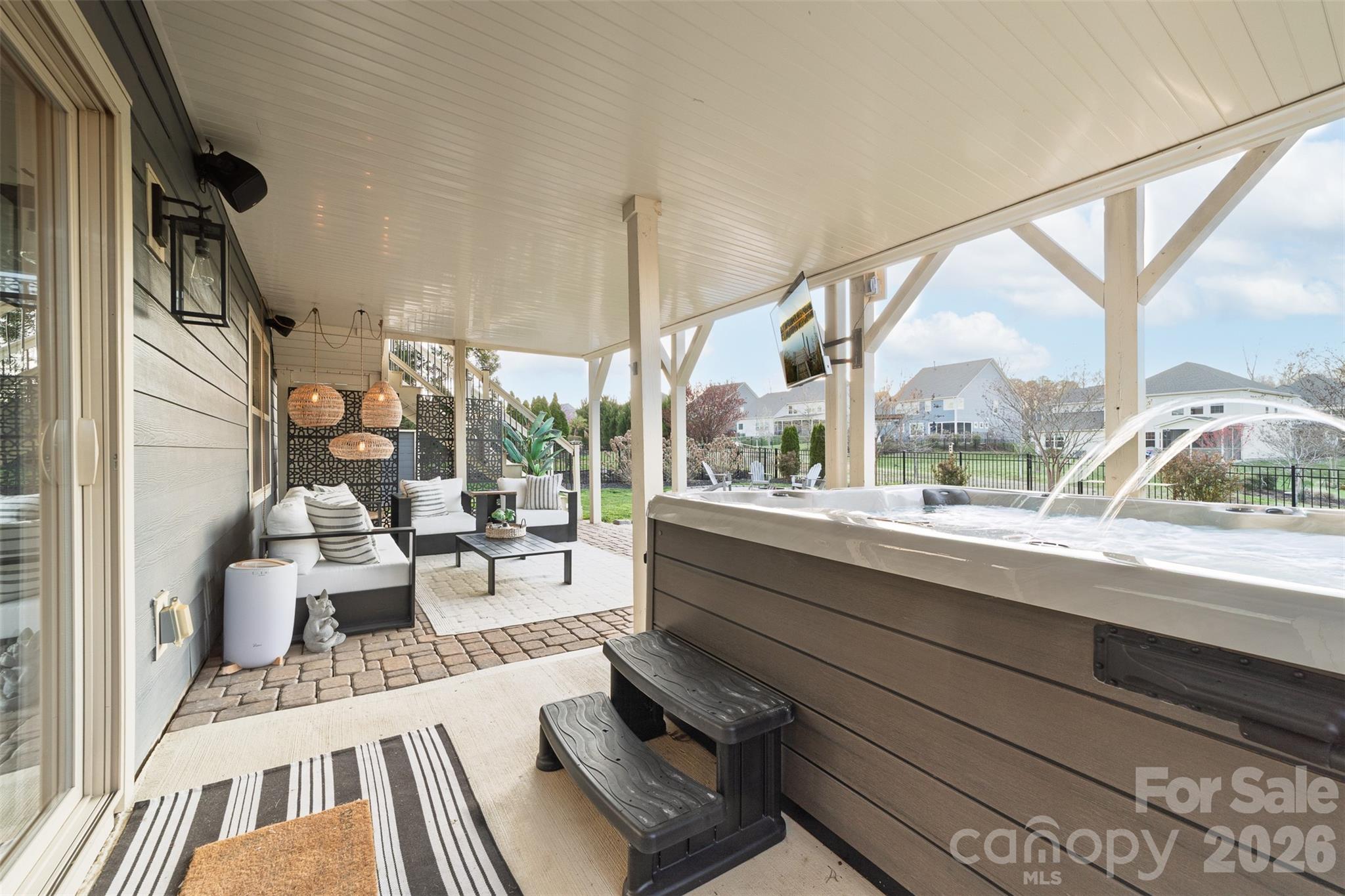 17549 Julees Walk Lane Davidson, NC 28036 - Photo 29 of 48 a living room with large windows