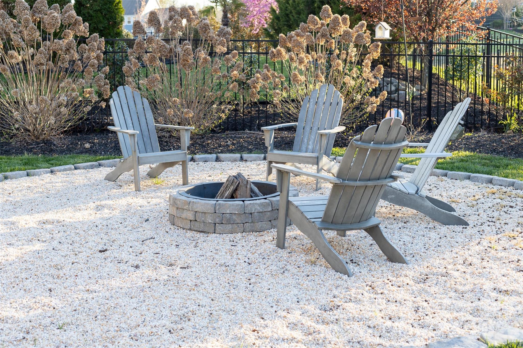 17549 Julees Walk Lane Davidson, NC 28036 - Photo 32 of 48 a view of a chairs and table in backyard