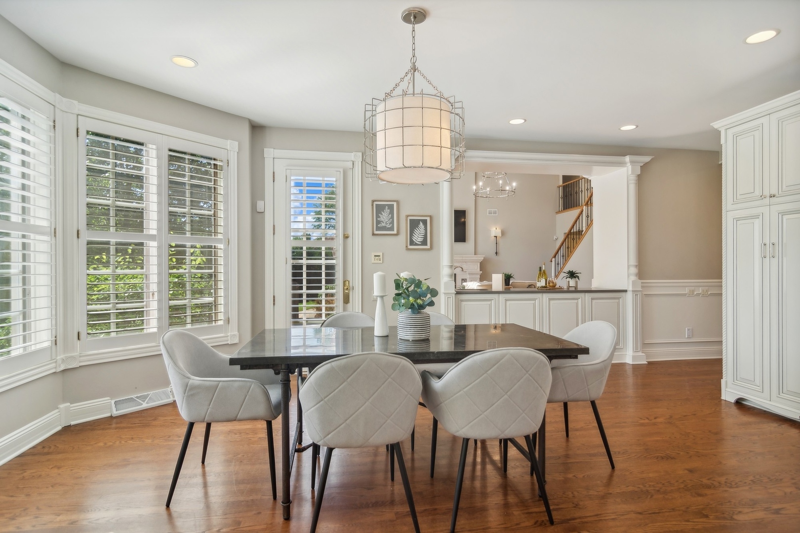 610 West Windsor Road Palatine, IL 60067 - Photo 11 of 51 a view of a dining room with furniture window and wooden floor
