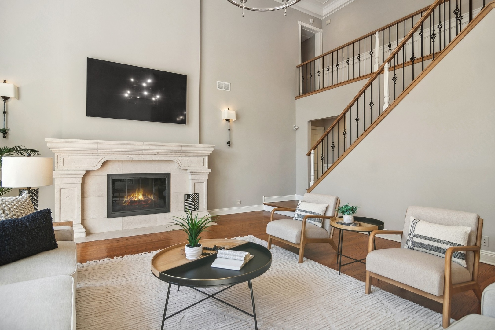 610 West Windsor Road Palatine, IL 60067 - Photo 14 of 51 a living room with furniture a flat screen tv and a fireplace