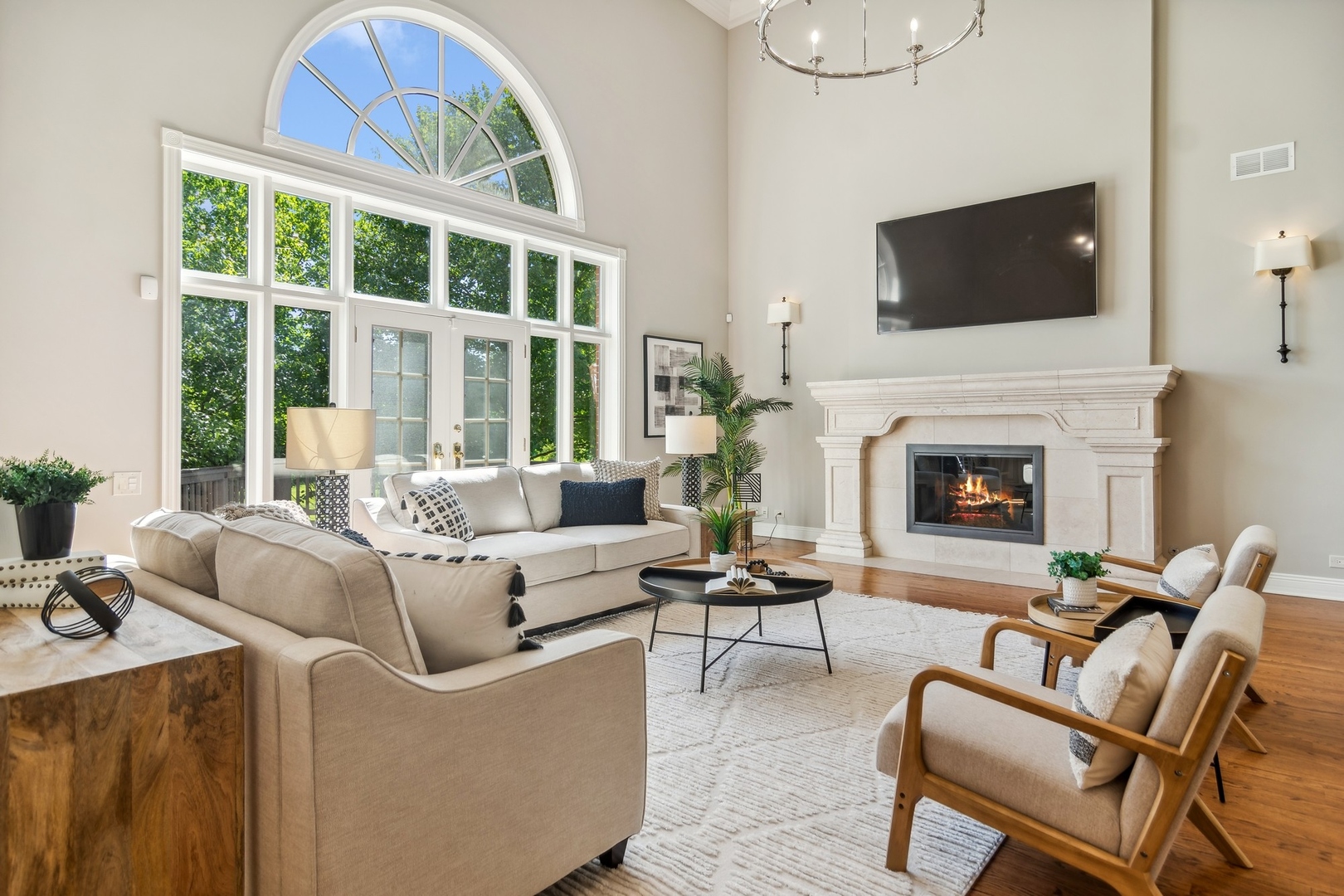 610 West Windsor Road Palatine, IL 60067 - Photo 15 of 51 a living room with furniture a fireplace and a flat screen tv