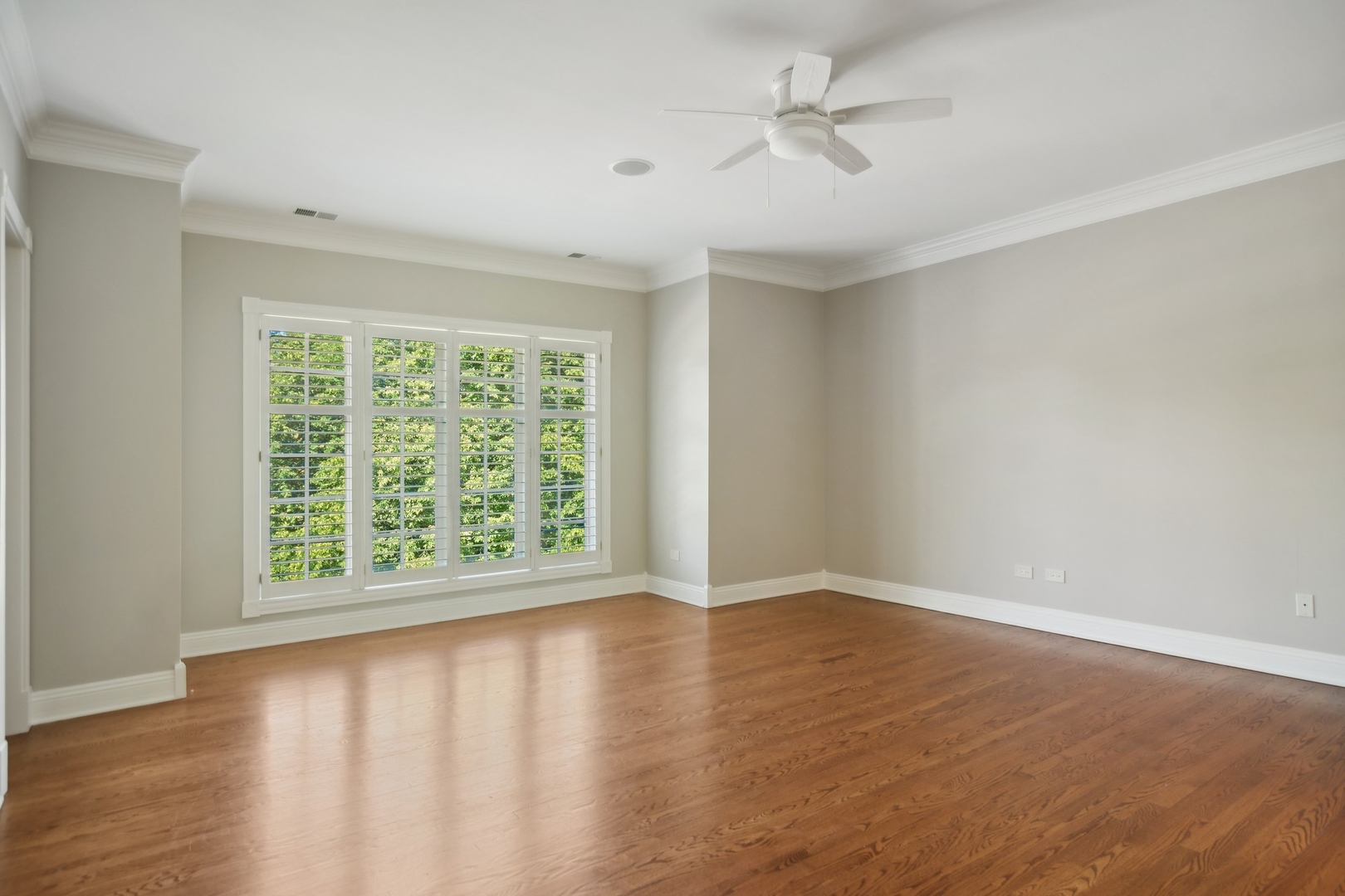 610 West Windsor Road Palatine, IL 60067 - Photo 31 of 51 wooden floor in an empty room with a window