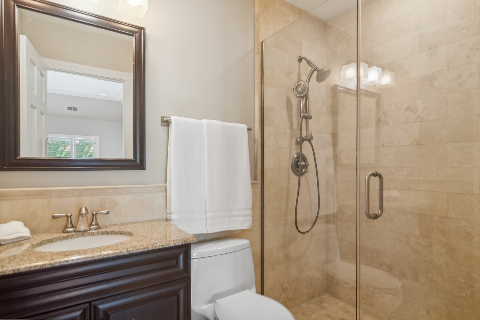 610 West Windsor Road Palatine, IL 60067 - Photo 32 of 51 a bathroom with a granite countertop sink a toilet and a mirror