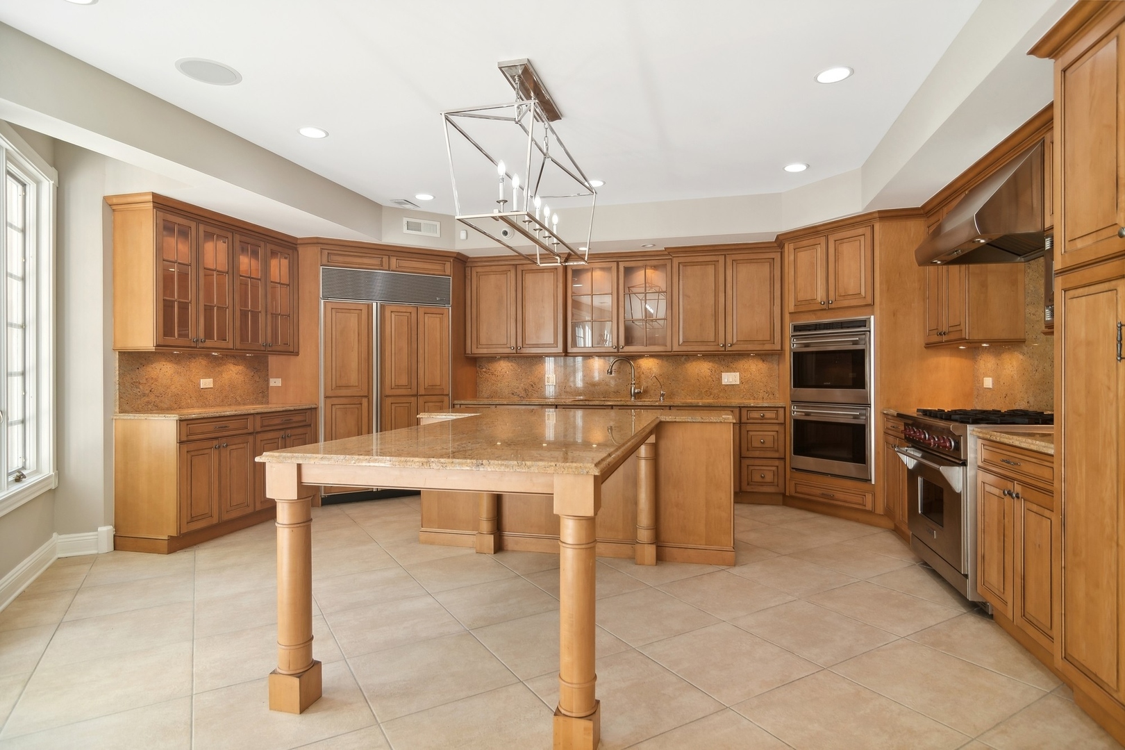 610 West Windsor Road Palatine, IL 60067 - Photo 39 of 51 a kitchen with counter top space cabinets and stainless steel appliances
