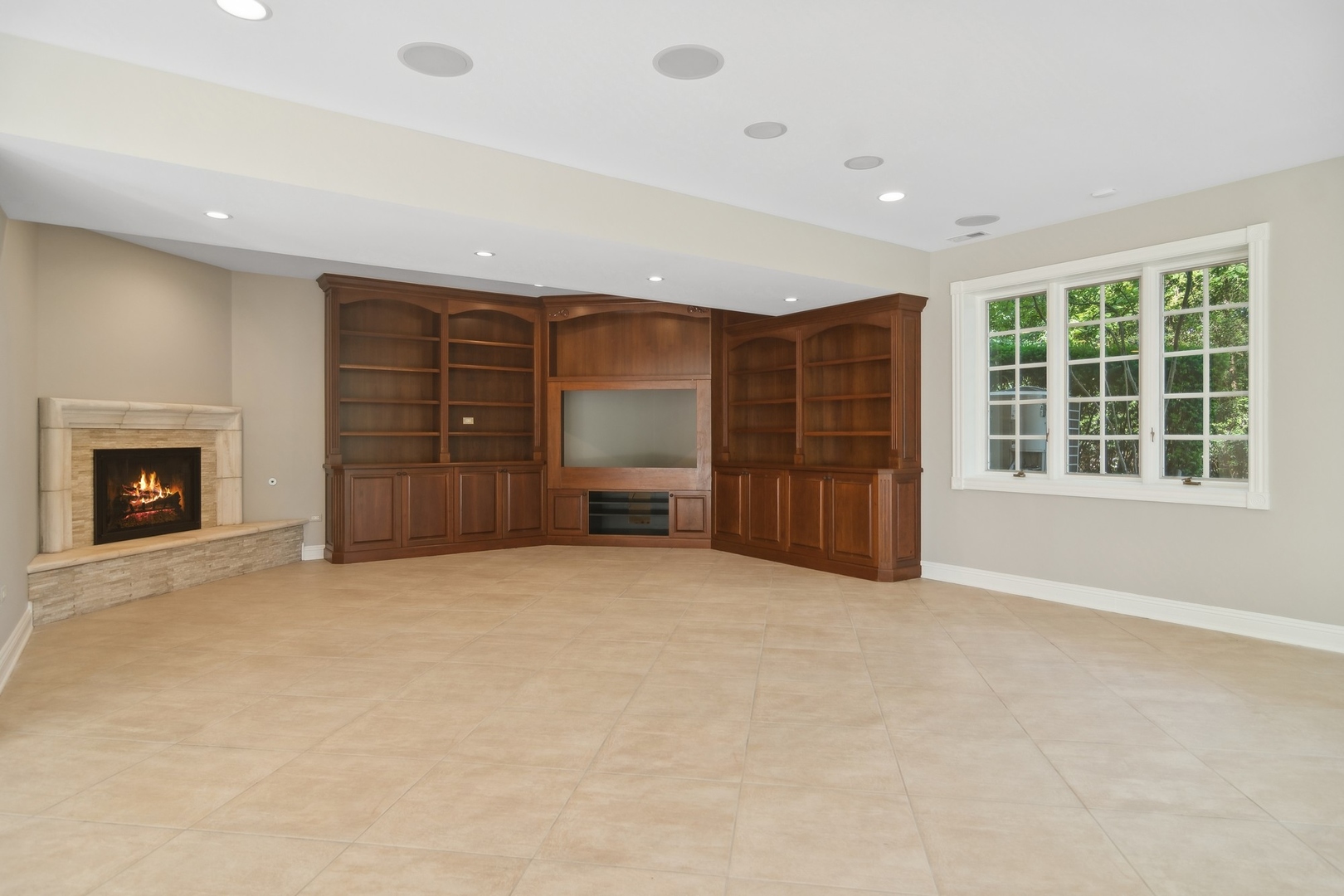 610 West Windsor Road Palatine, IL 60067 - Photo 40 of 51 a view of an empty room with a fireplace and cabinet
