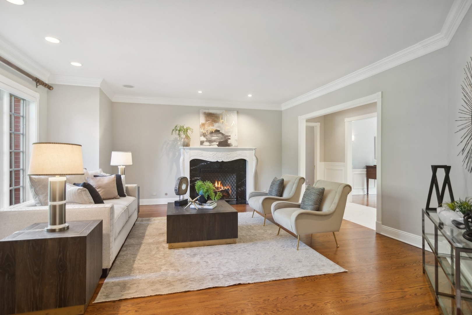 610 West Windsor Road Palatine, IL 60067 - Photo 6 of 51 a living room with furniture and a fireplace