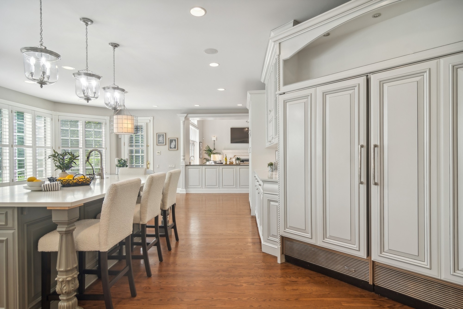 610 West Windsor Road Palatine, IL 60067 - Photo 8 of 51 a view of a dining room and livingroom with furniture wooden floor a chandelier