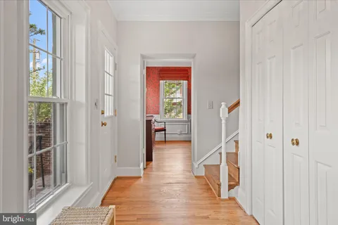 a spacious bathroom with a granite countertop sink a mirror and a