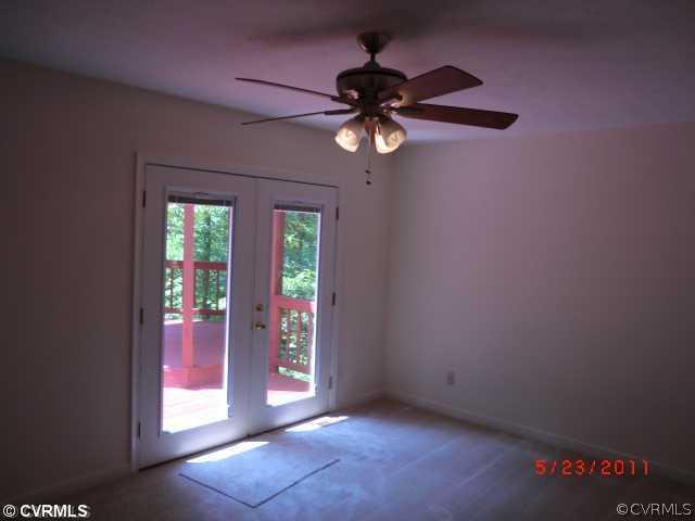 109 Ackerman Lane Ruther Glen, VA 22546 - Photo 4 of 5 a view of an empty room with a window