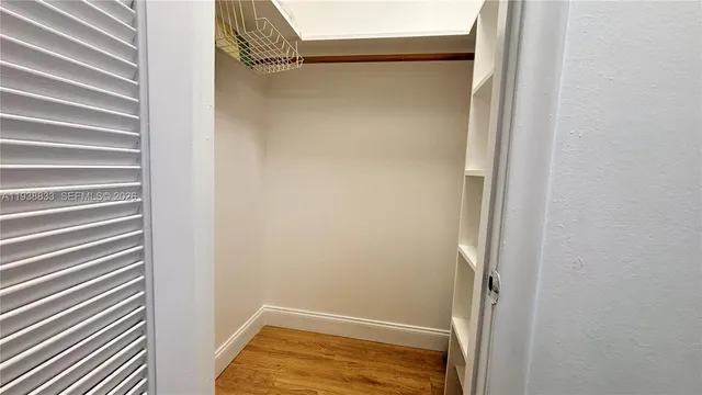 a view of an empty walk in closet